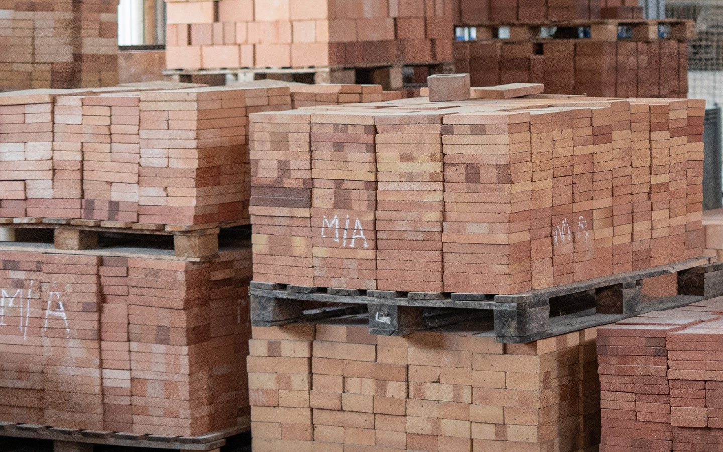 Stacked refractory fire bricks